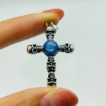 4-types-skull-cross-pendant-wholesale-charoite-sunstone-malachite-moonstone-wholesale-crystals-349074